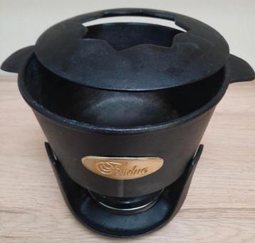 Gietijzeren fondue set.