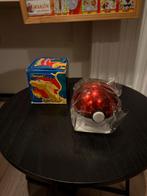 Pokemon 1999 burger king 23k gold plated Charizard (sealed)!, Ophalen of Verzenden, Nieuw, Losse kaart
