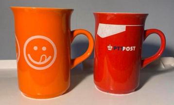 Oranje en rode mok van TNT en PTTPOST. Hoogte 10,5 cm. beschikbaar voor biedingen