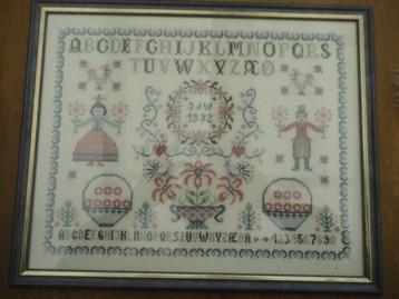 Mooie merklap in lijst achter glas met jaartal 1992 + J d W beschikbaar voor biedingen