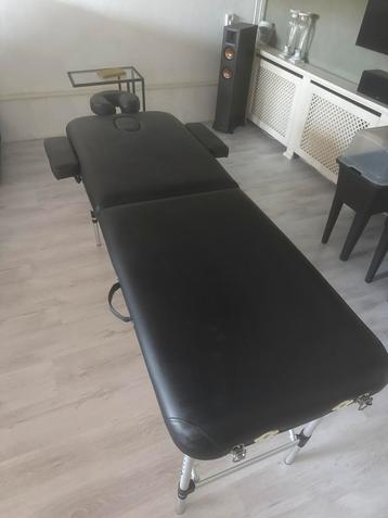 Massagetafel zwart kunstleer inklapbaar beschikbaar voor biedingen