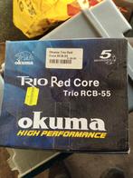 Gevraagd: Okuma Trio Red Core RCB-55 Vis Molen, Watersport en Boten, Ophalen of Verzenden, Molen