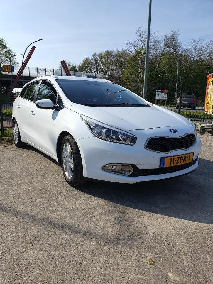 Kia (Pro) Cee d 1.6 GDI Sporty Wagon DCT 2013 Wit Automaat, Auto's, Kia, Particulier, (Pro) Cee d, ABS, Achteruitrijcamera, Adaptieve lichten
