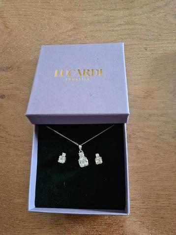 Oorbellen met ketting zilver  beschikbaar voor biedingen