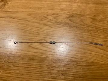 Zilveren armband met lemniscaat beschikbaar voor biedingen