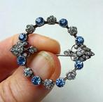 Antiek zilveren broche: krans-vormig, blauw + witte stenen, Sieraden, Tassen en Uiterlijk, Antieke sieraden, Ophalen of Verzenden