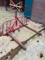 Verbouwde mestriek voor grote ronde balen, Ophalen