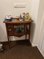 Antiek theekastje, Ophalen