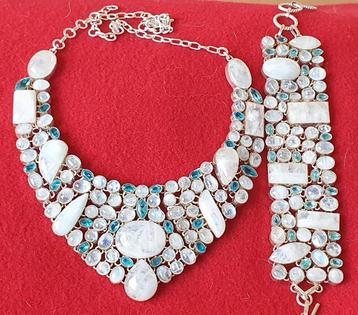 Zilveren collier en armband met maansteen en topaas beschikbaar voor biedingen