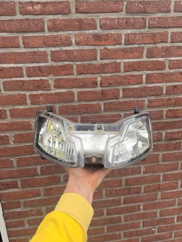 Aprilia sr50 factory koplamp beschikbaar voor biedingen