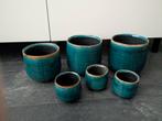 Serie turquoise bloempotten, Ophalen