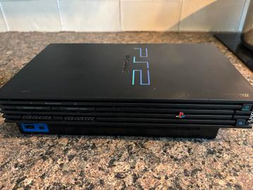 PlayStation 2 met 2 Spellen beschikbaar voor biedingen