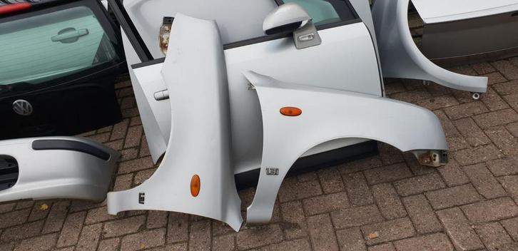 NISSAN MICRA VOORSCHERMEN BJ 93 TOT 97, Auto-onderdelen, Carrosserie en Plaatwerk, Spatbord, Gebruikt, Ophalen of Verzenden