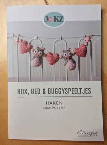 Box, bed en buggyspeeltjes beschikbaar voor biedingen