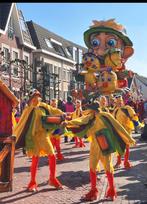 Loopgroep. 20 kanariepakken en twee poezenpakken, Eén persoon, Kortingskaart