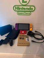 Nintendo switch incl 2 spellen en meer, Spelcomputers en Games, Spelcomputers | Nintendo Switch, Ophalen, Zo goed als nieuw, Met 2 controllers