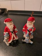 2 stenen kerstmannetjes, Ophalen