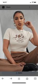 Top met engelen print maat xs, nieuw, Kleding | Dames, Tops, Beige, Nieuw, Ophalen of Verzenden, Korte mouw