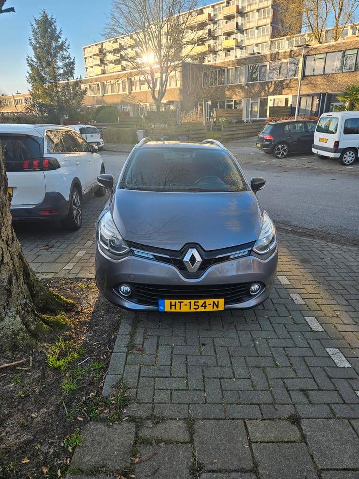 Renault Clio 1.5 DCI 66KW Estate 2015 Grijs, Auto's, Renault, Particulier, Clio, Diesel, A, Stationwagon, Handgeschakeld, Origineel Nederlands
