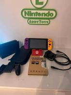 Nintendo switch incl 2 spellen en meer, Spelcomputers en Games, Spelcomputers | Nintendo Switch, Ophalen, Zo goed als nieuw, Met 2 controllers