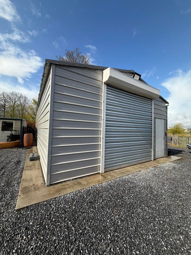 Demontabele geïsoleerde loods te koop 12,30m x 6,20, Ophalen, Zo goed als nieuw, Schuur