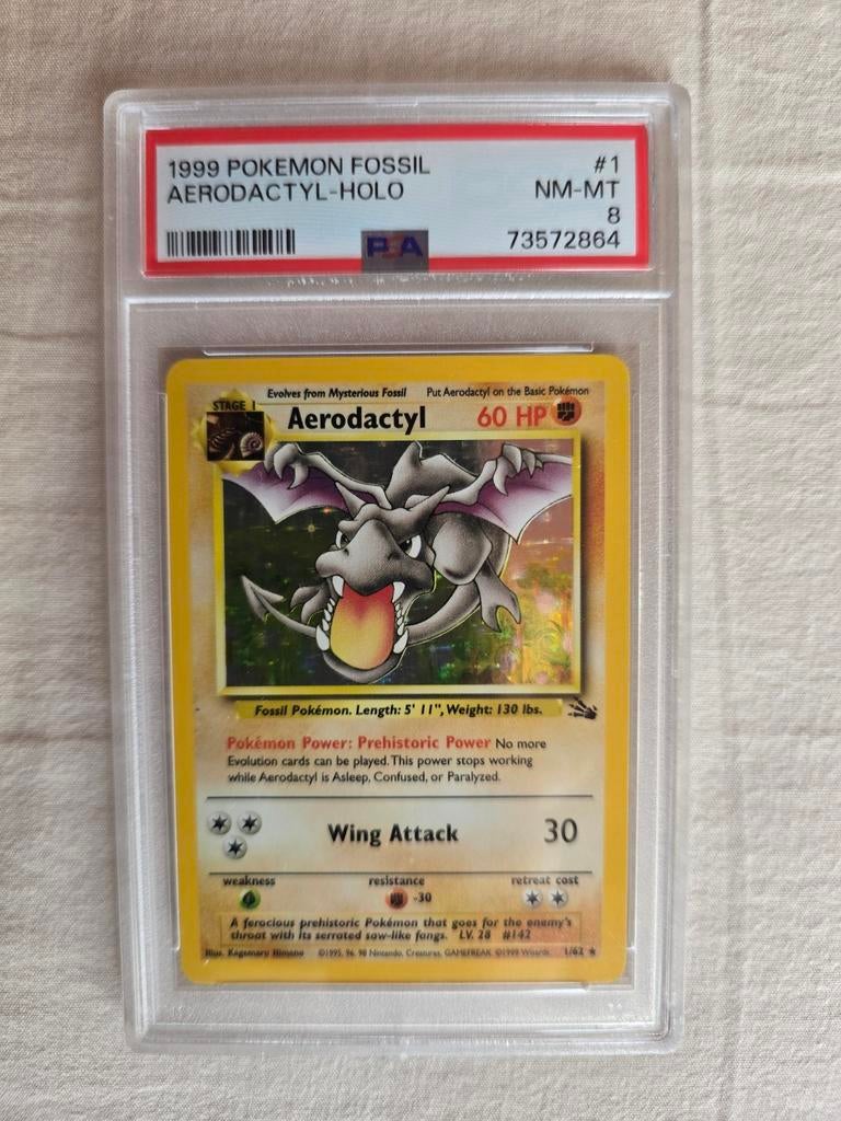 1999 Pokémon Fossil Aerodactyl holo psa 8, Ophalen of Verzenden, Zo goed als nieuw, Losse kaart