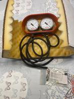 Vacuümmeters carburateurs, Ophalen