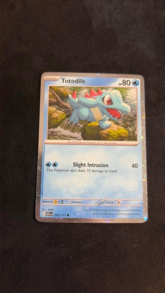 Totodile 041/217 Cosmos Holo, Ophalen of Verzenden, Zo goed als nieuw