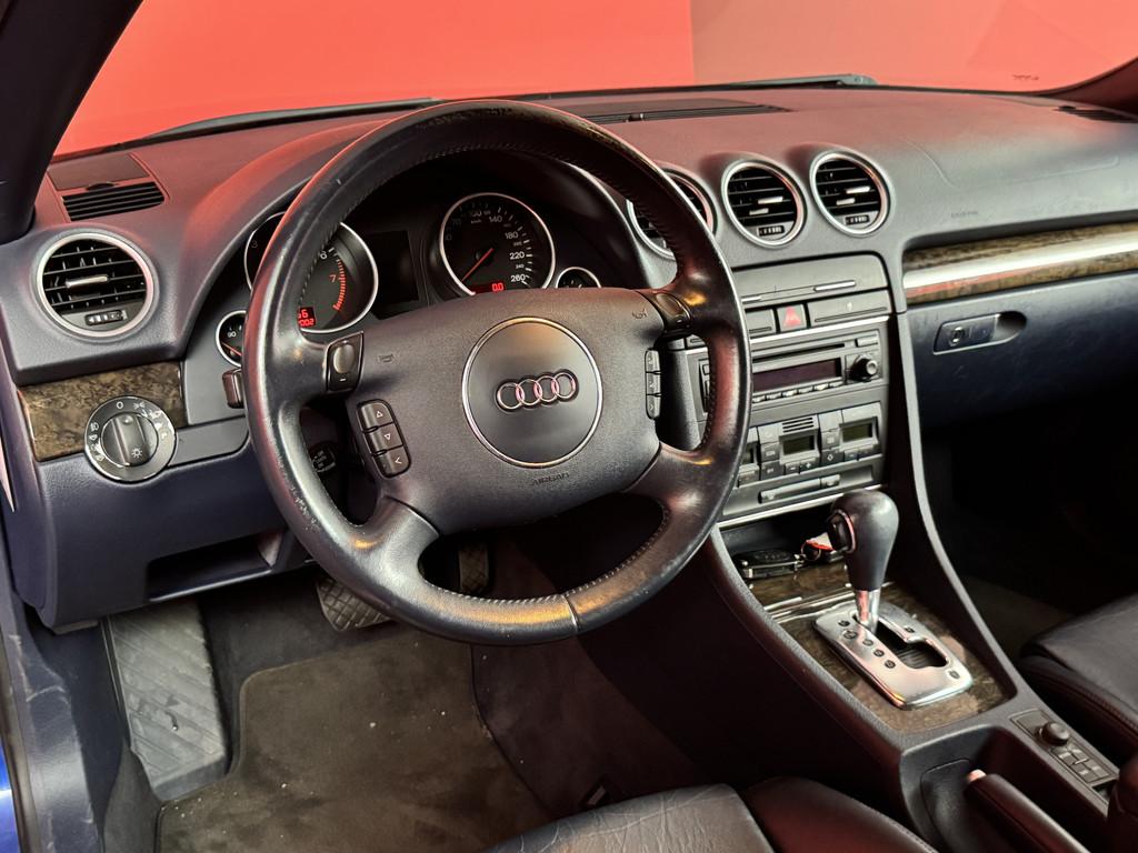 Audi A4 Cabriolet 2.4 V6 Exclusive, Auto's, Gebruikt, Zwart, Cabriolet, A4