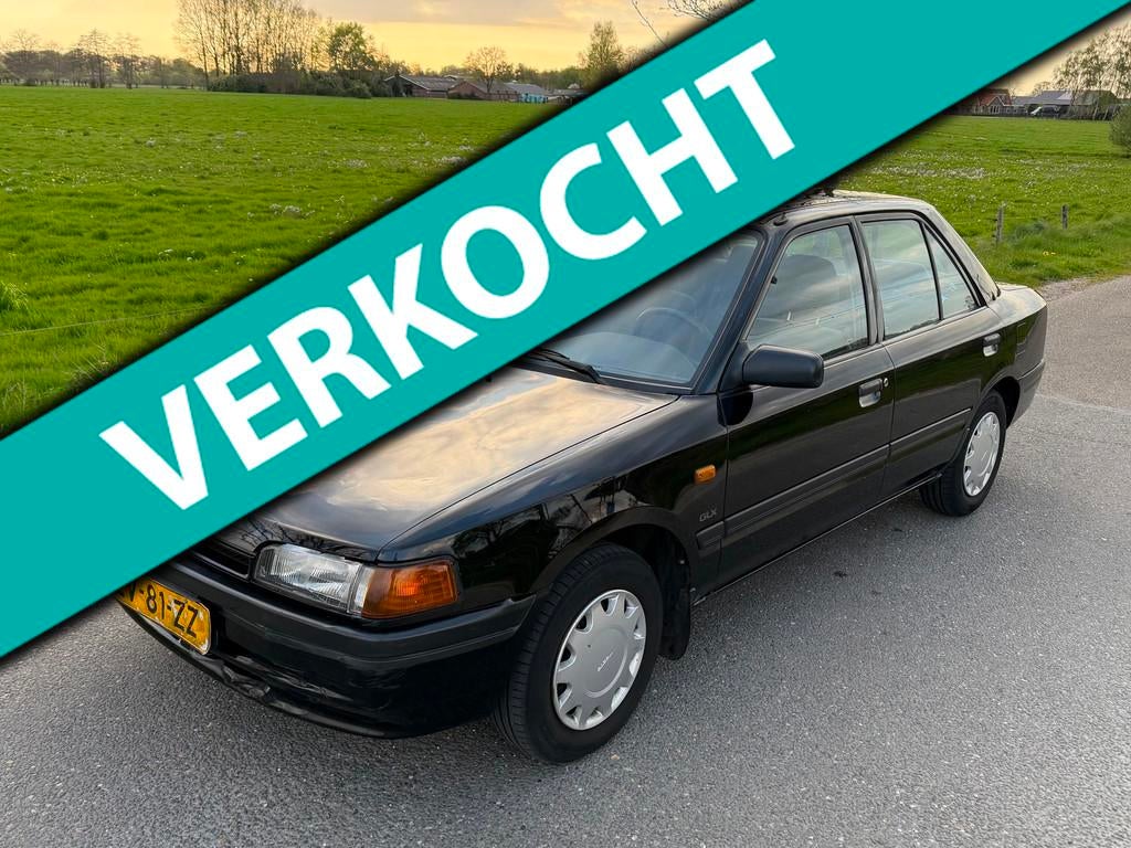 Mazda 323 1.8i GLX, Auto's, Gebruikt, 4 cilinders, Zwart, Origineel Nederlands