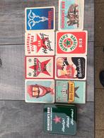 Heineken blikje met bierviltjes en onderzetters porselein, Ophalen of Verzenden, Zo goed als nieuw, Viltje(s), Heineken