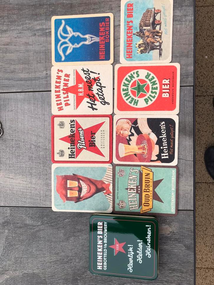 Heineken blikje met bierviltjes en onderzetters porselein, Verzamelen, Biermerken, Zo goed als nieuw, Viltje(s), Heineken, Ophalen of Verzenden