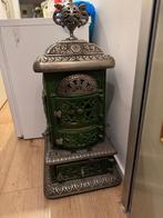 Gietijzeren antieke kachel te koop bieden €100, Huis en Inrichting, Kachels, Ophalen, Gebruikt, Houtkachel, Vrijstaand