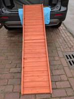 Auto loopplank hond, Ophalen