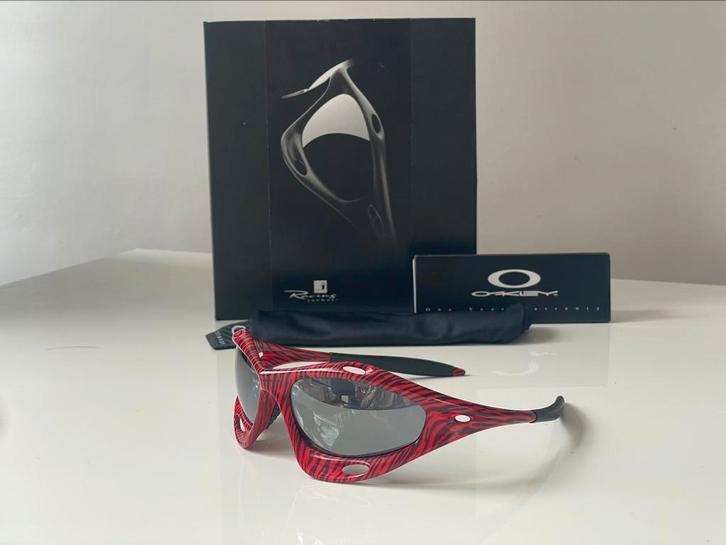Vintage NOS Oakley Racing Jacket - Red Tiger/ Black Iridium, Sieraden, Tassen en Uiterlijk, Zonnebrillen en Brillen | Heren, Nieuw