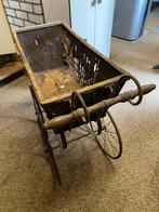 Oude kinderwandelwagen van omstreeks 1900, Ophalen