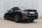 BMW i4 M50 High Executive 84 kWh / Trekhaak / Active Cruise, Gebruikt, Met garantie (alle), Alcantara, Zwart