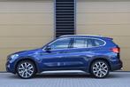 BMW X1 sDrive20i VDL Nedcar Edition * X line * Panorama dak, Auto's, BMW, 1998 cc, Met garantie (alle), Blauw, Lichtsensor