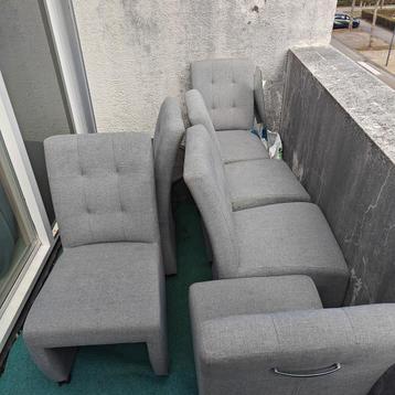 Woonkamer eet stoelen met wielen en handvaat stoft grijs beschikbaar voor biedingen
