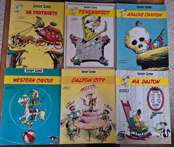6 oude Lucky Luke strips en een popje (Morris Dargaud) beschikbaar voor biedingen