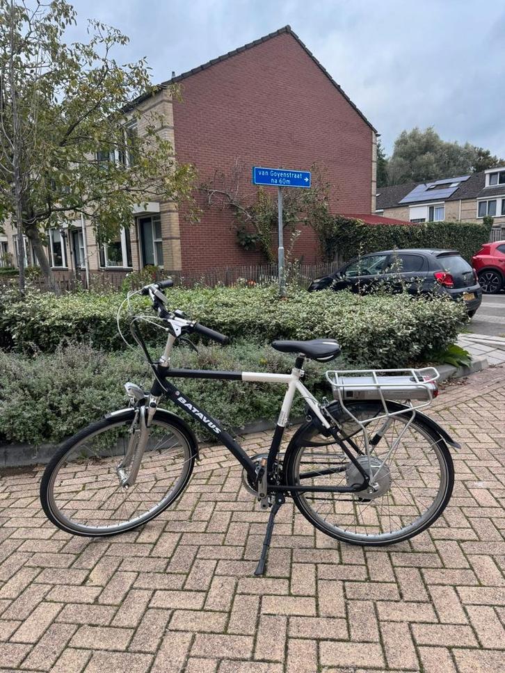 Te koop Elektrische Heren Fiets batavus, Fietsen en Brommers, Elektrische fietsen, Gebruikt, Batavus, 55 tot 59 cm, 30 tot 50 km per accu
