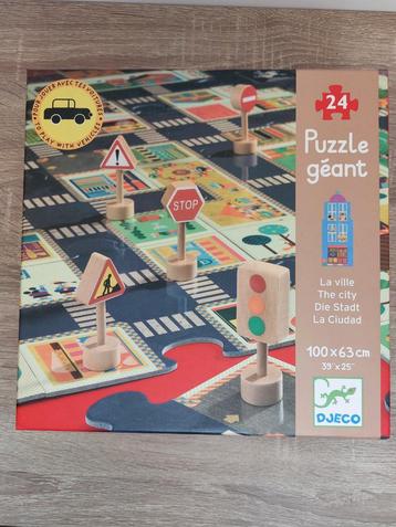Djeco Vloerpuzzel Grote Stad + Verkeersborden beschikbaar voor biedingen