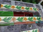 9 stuks jugendstil randtegels met opgelegd blad en bloem