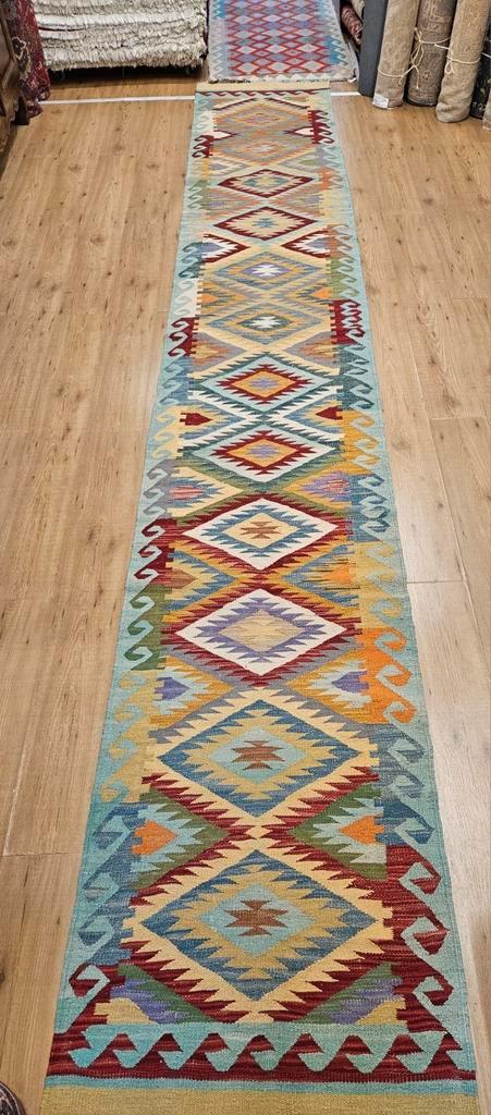 Handgeweven oosterse wollen kelim loper 484x76, Huis en Inrichting, Stoffering | Tapijten en Kleden, Nieuw, 50 tot 100 cm, 200 cm of meer