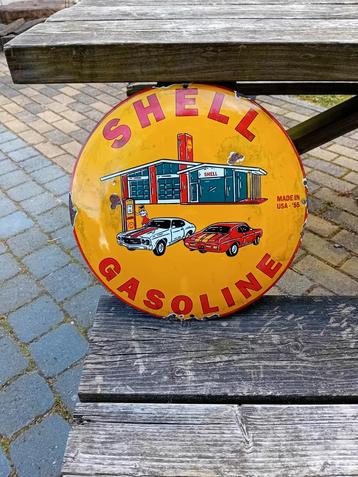 Mooi emaille bord van shell. 