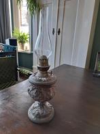 Zware olielamp, Ophalen, Brons