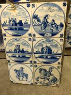 Serie delfsblauwe tegeltjes van een antieke schouw., Ophalen