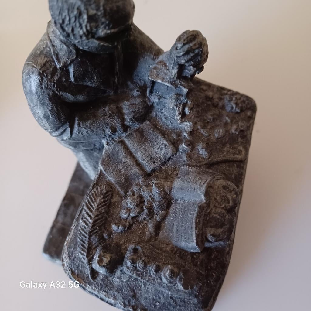 Bronzen beeld van de geld wisselaar ., Ophalen