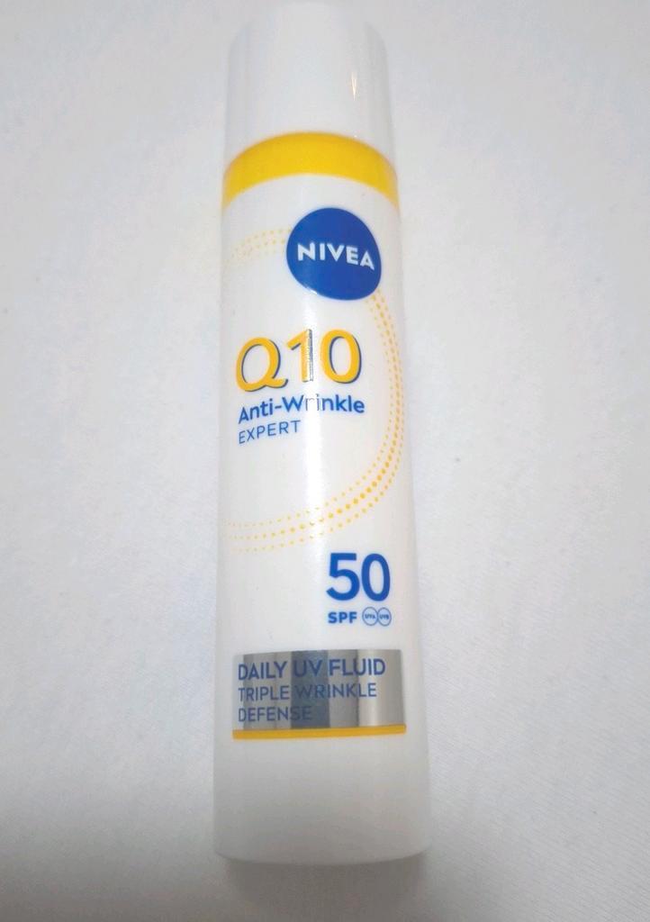 Nivea Q10 UV fluid SPF 50, Sieraden, Tassen en Uiterlijk, Uiterlijk | Gezichtsverzorging, Zo goed als nieuw, Verzorging, Gehele gezicht