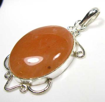 h. curieuze edelsteenhanger ORANJE CALCIET + gratis  beschikbaar voor biedingen